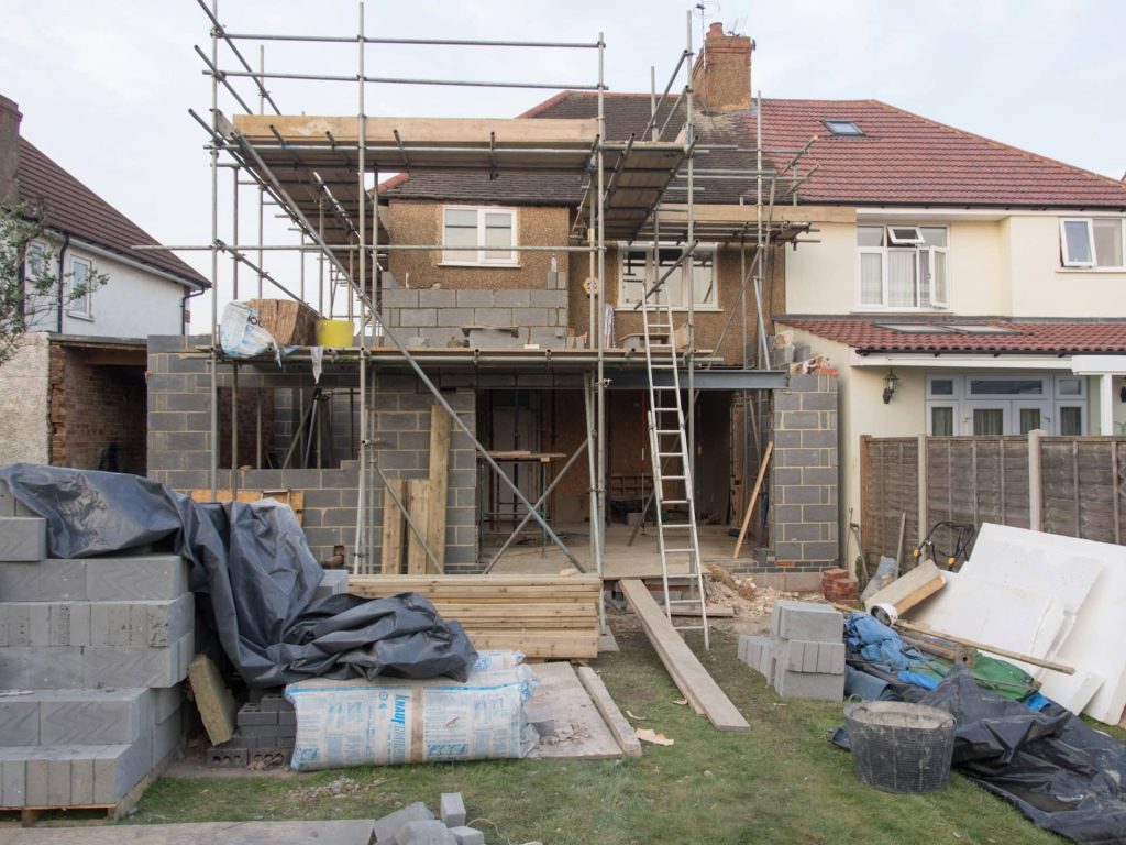 Scaffolding and building blocks of an early-build house extension