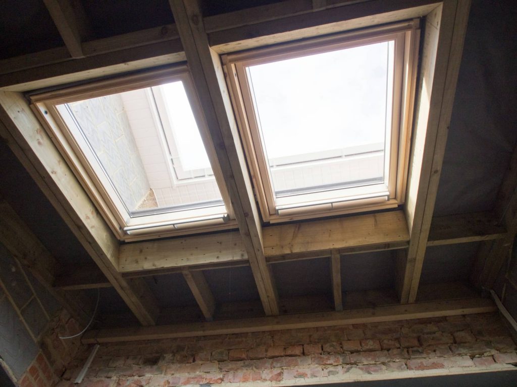 A velux rooflight conversion, with two new windows added